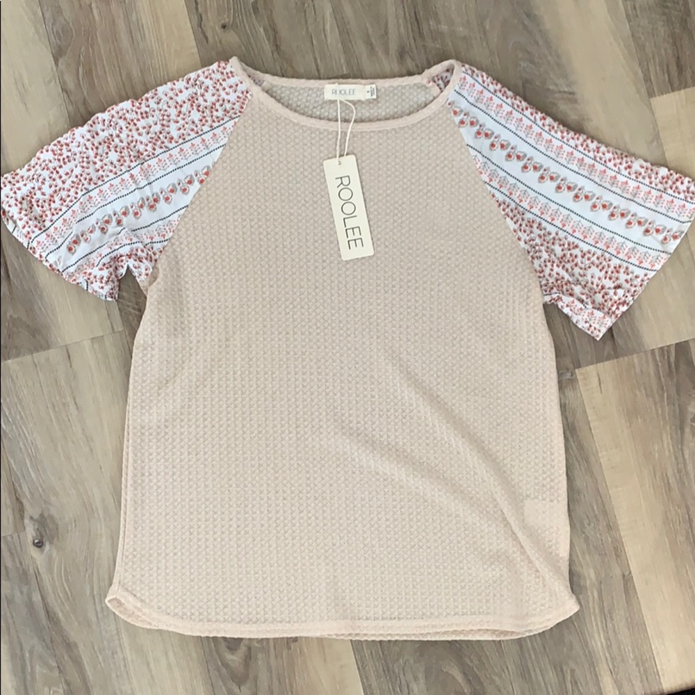 roolee top with tags
